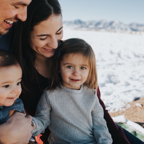 A young family together outdoors